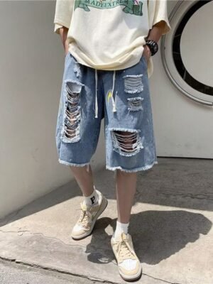 StyleCast x Revolte Men Relaxed Fit Mid-Rise Highly Distressed Heavy Fade Capris